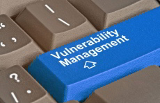 Vulnerability Management key on a keyboard