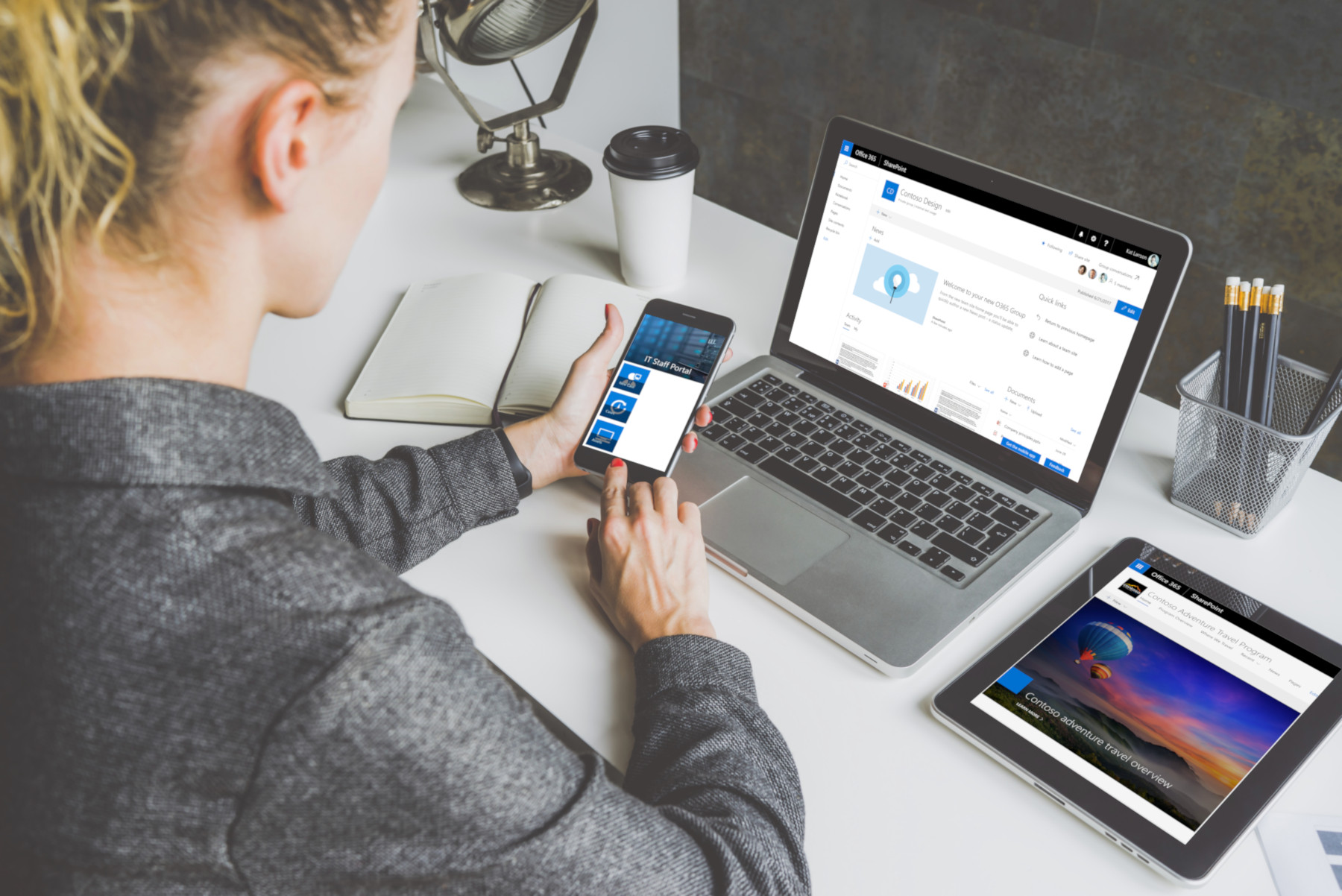 How can you adapt sharepoint to your business - image features a young woman looking at different screen types all configured for different sharepoint applications