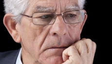A CEO looks worried about his future