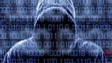 Detect hackers - a hacker stands in the shadows, with no visible face