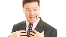 Who? Me? - a businessman feigns surprise